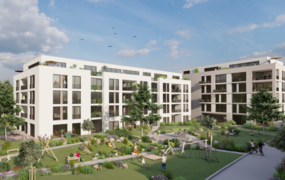 Ein Häuserensemle mit grünem Innenhof